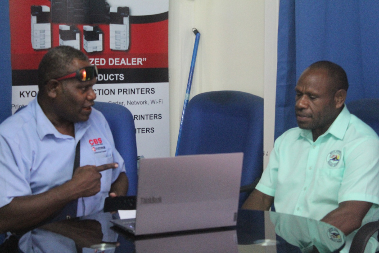 Central Business Systems team with customer